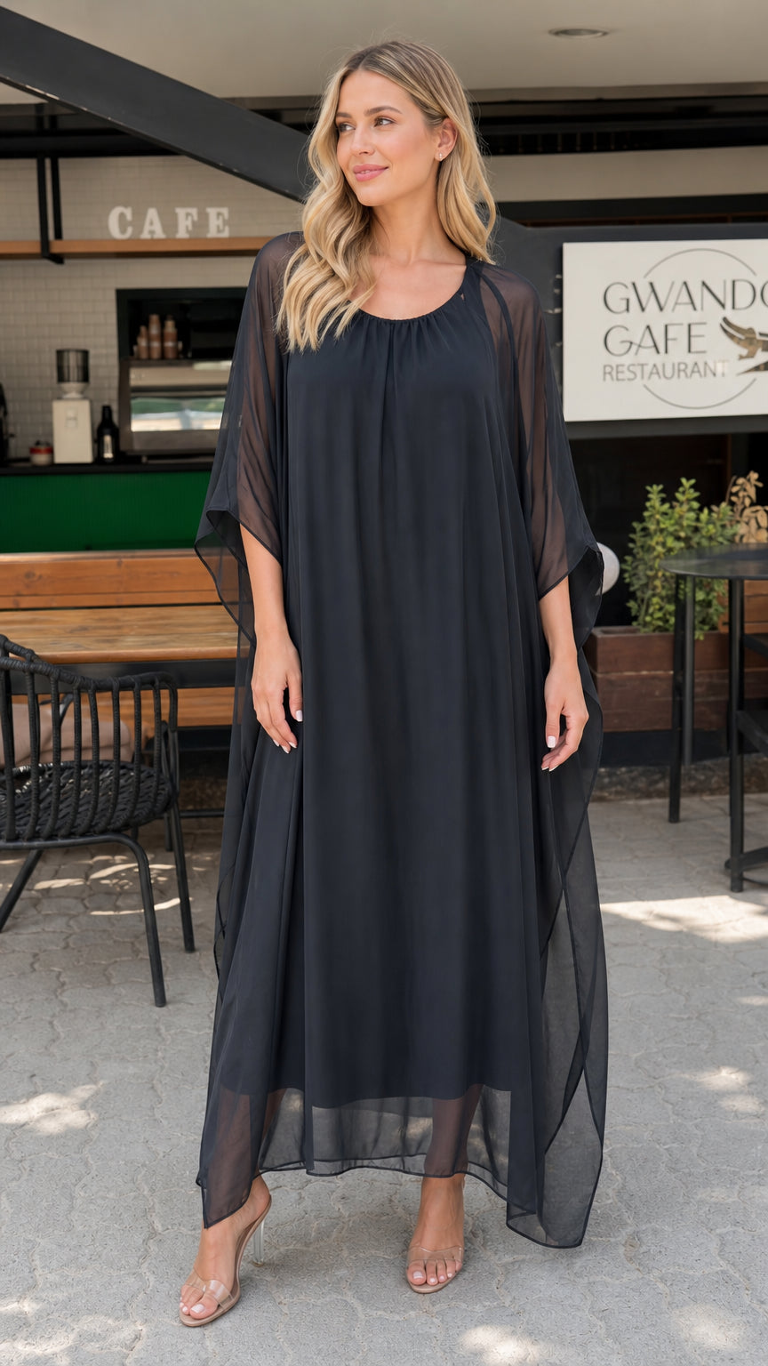 Model wearing black sheer chiffon kaftan maxi dress front view