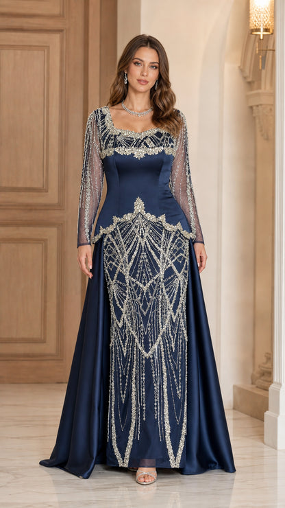 Navy Blue long sleeve formal evening gown with beaded bodice and flowing skirt