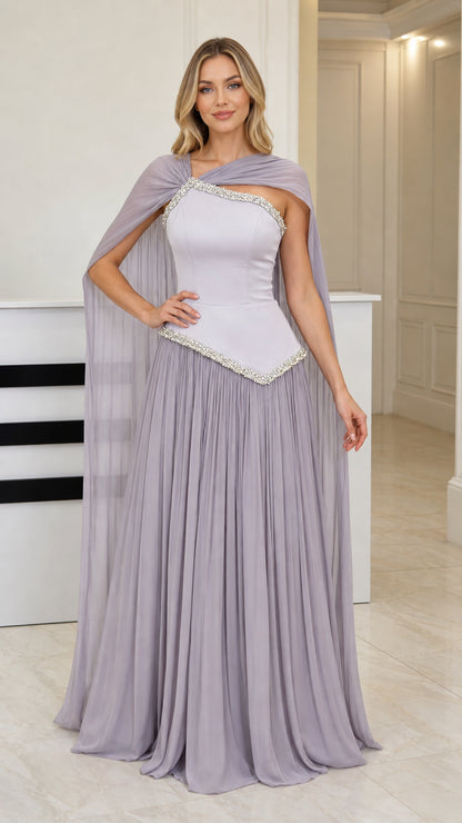 Front view of model wearing dusty lilac rhinestone basque waist chiffon cape evening gown