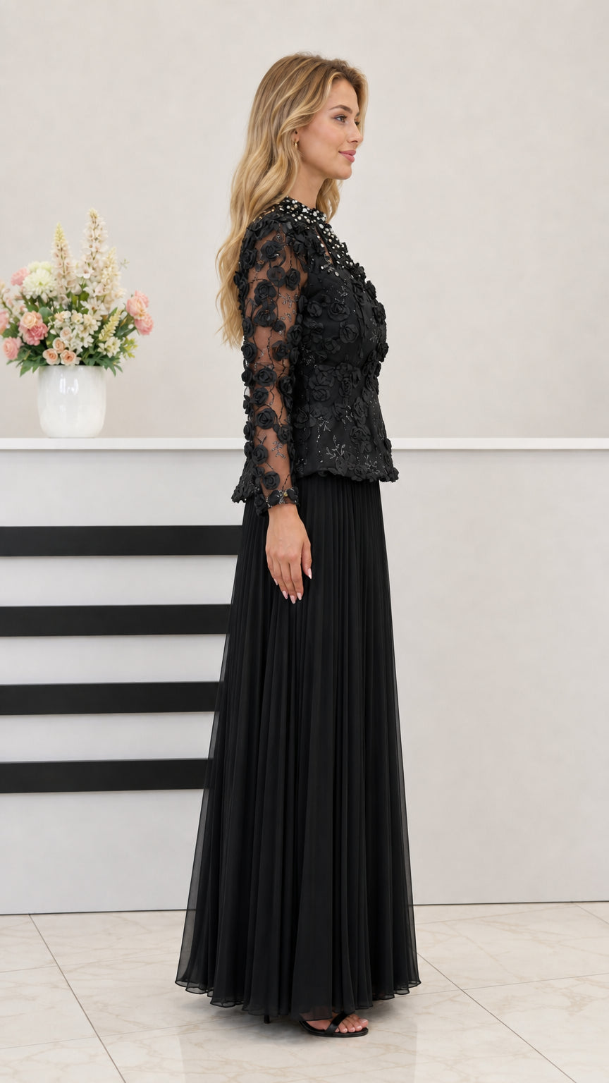 Side angle view of model wearing black lace peplum maxi dress