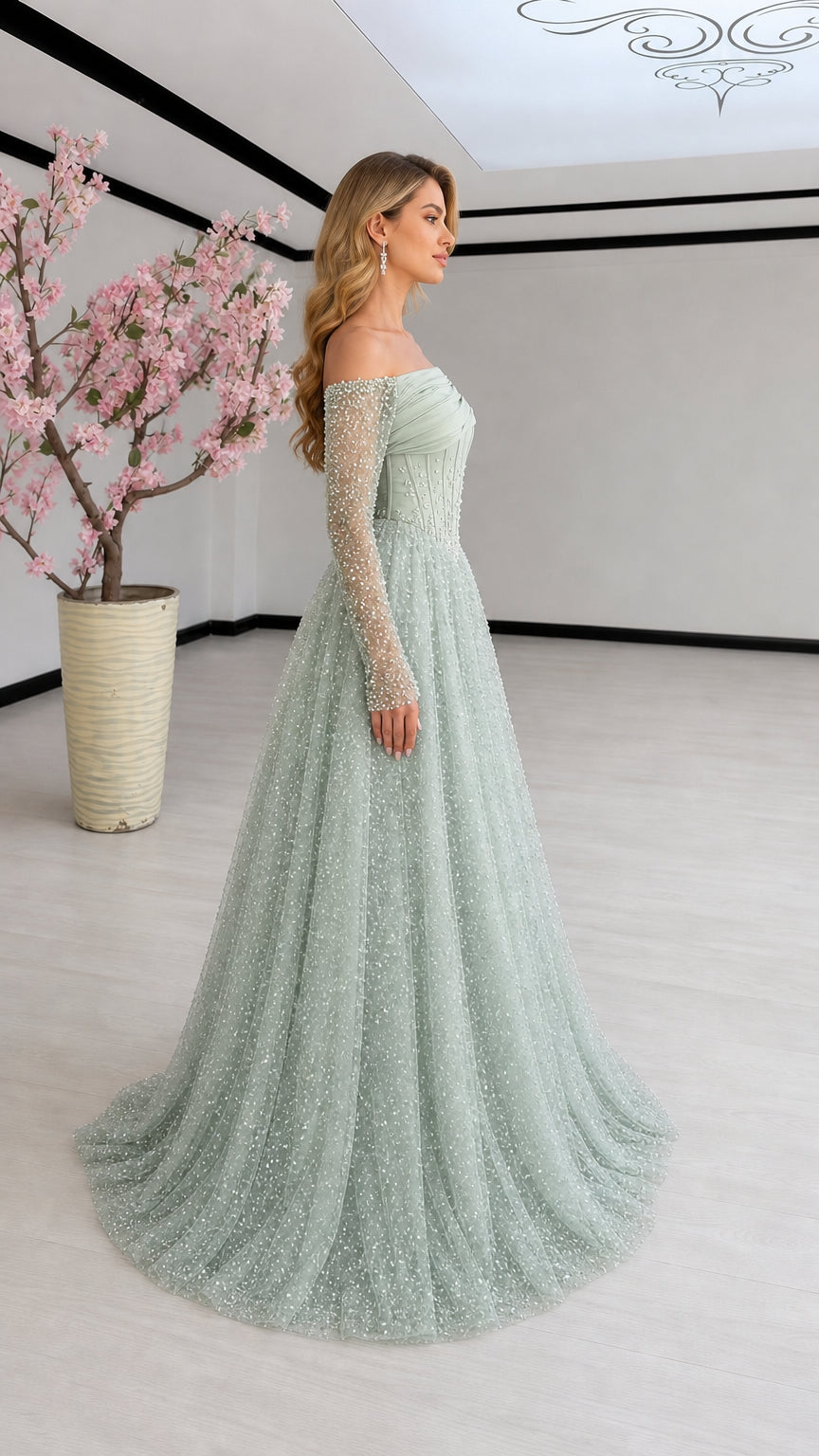 Side view of model wearing Sage Green off-shoulder sparkling ball gown