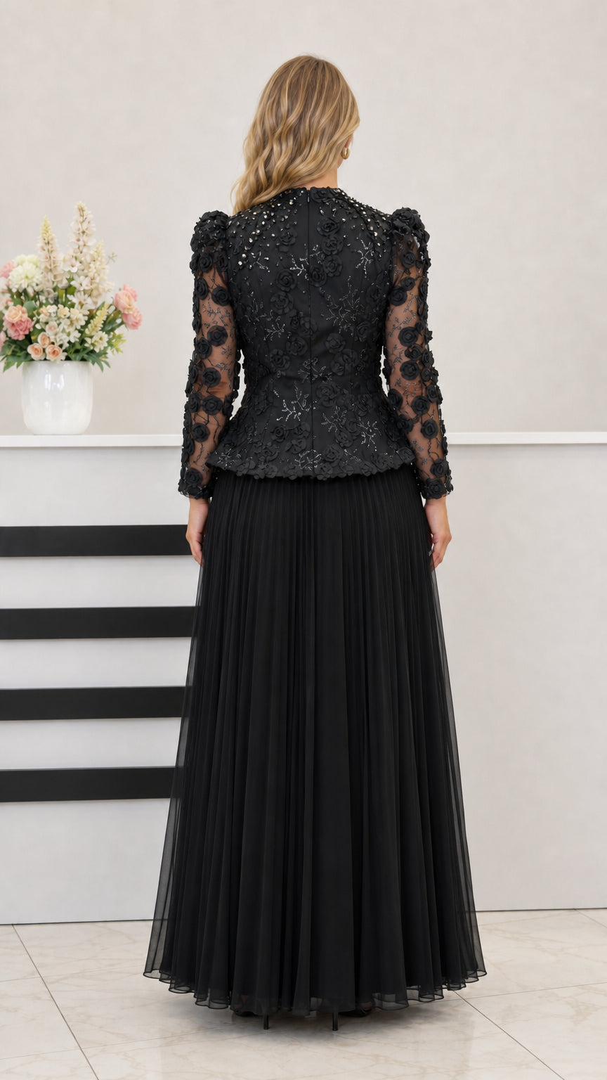 Back view of black long sleeve beaded lace peplum formal dress