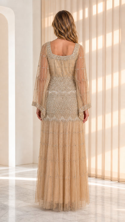 Back view of champagne gold embellished square back maxi formal gown