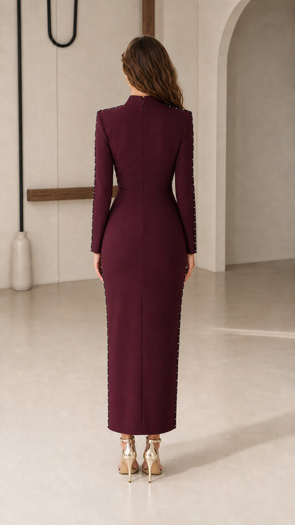 Back view of tailored burgundy long sleeve formal maxi dress