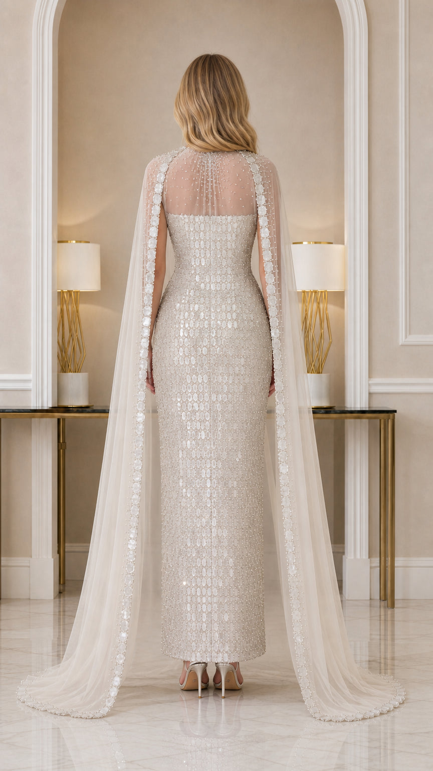 Back view of Champagne formal column dress with long sheer cape