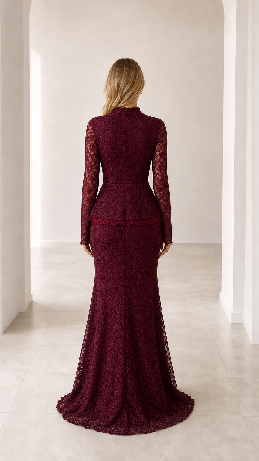 Back view of model in burgundy floor length lace peplum gown