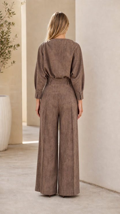 Back view of taupe cowl neck blouse and tailored wide-leg trousers