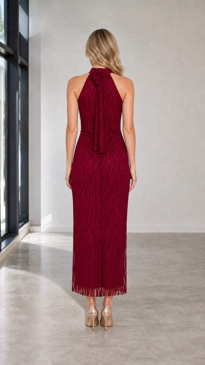 Back view of burgundy halter dress with tie detail