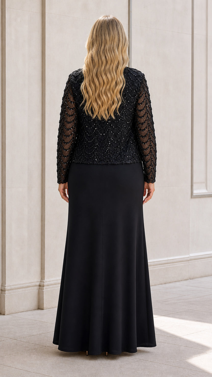 Back view of black floor-length formal dress and long-sleeve jacket