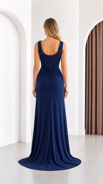 Back view of navy blue square neck formal dress with subtle back ruching detail