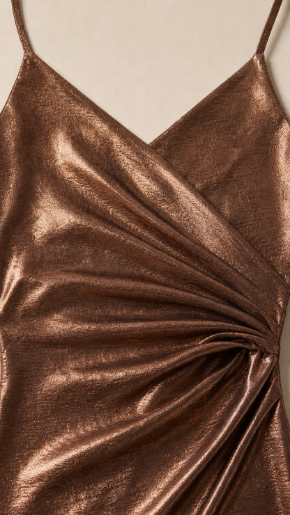 Close-up detail of metallic Bronze fabric and side ruching pleats