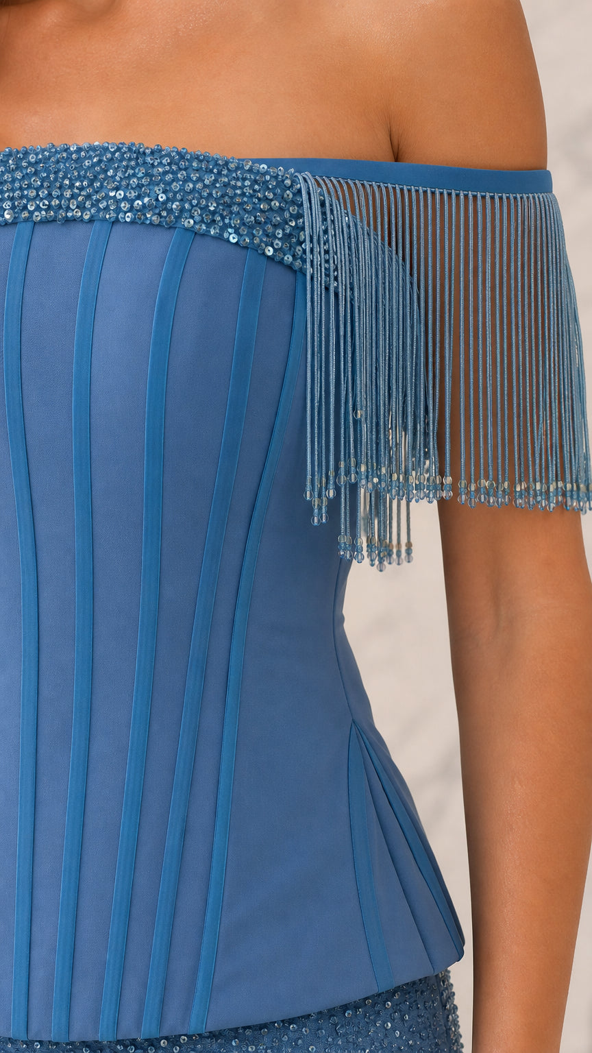 Close-up detail of Slate Blue corset bodice boning, beaded neckline, and fringe shoulder trim