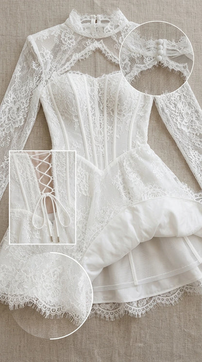 Close-up detail of white lace mini dress neckline, lace-up back, and eyelash lace hem