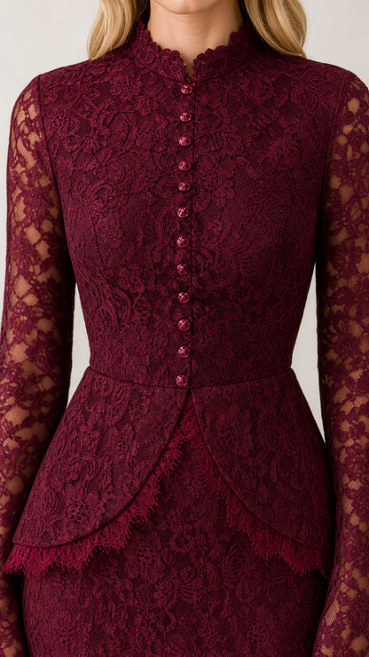 Close up view of burgundy button front lace bodice and peplum detail