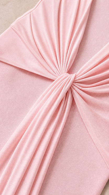 Close-up detail of the gathered side knot and flowing drape fabric in Light Pink