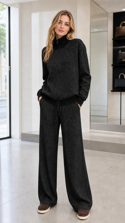 Full front view of woman wearing Charcoal black knit zip jacket and wide-leg pants set