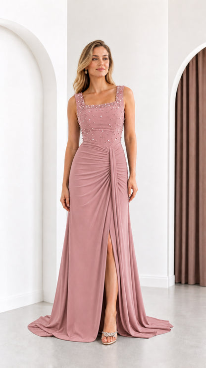 Full length front view of dusty rose pink beaded formal maxi dress with ruched waist
