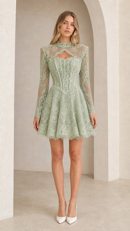 Front view of model wearing sage green floral lace corset mini dress