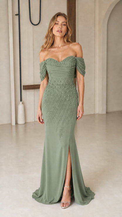 Front view of sage green off-the-shoulder beaded mermaid evening dress with slit