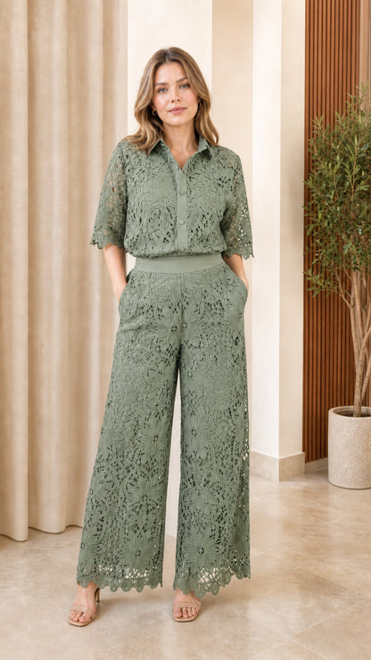Front view of model wearing sage green lace matching set