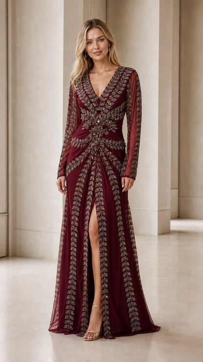 Model wearing burgundy beaded evening gown with front slit