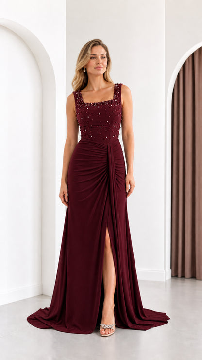 Full length front view of burgundy wine red beaded formal evening dress with slit