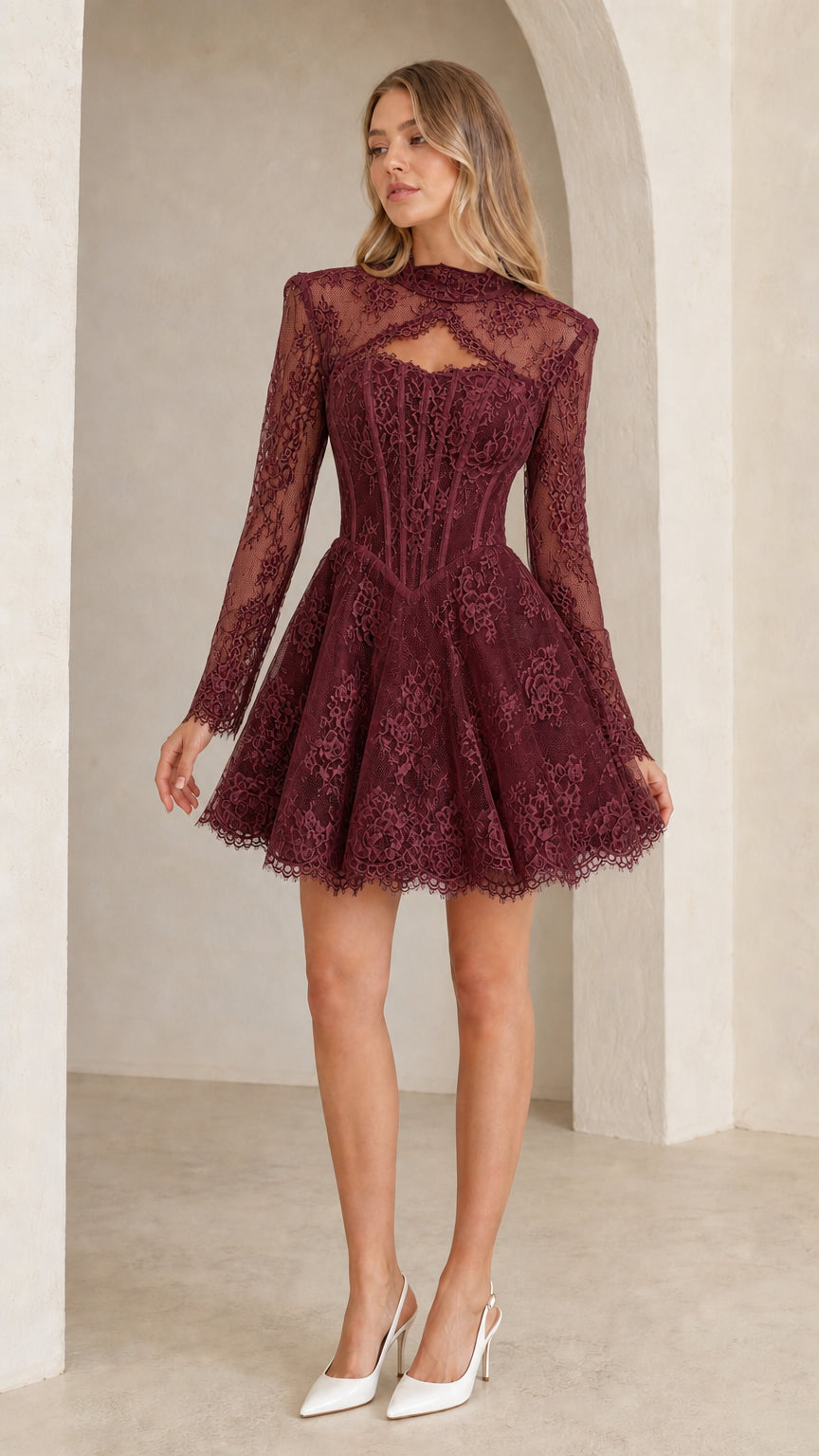 Front view of model wearing burgundy wine floral lace long sleeve corset mini dress