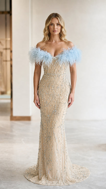 Champagne beaded mermaid gown featuring contrasting light blue feather trim