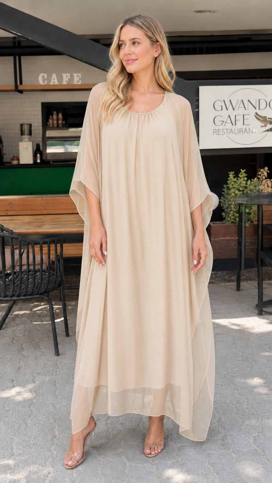 Model wearing beige cream chiffon kaftan maxi dress